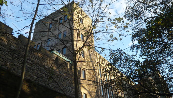 Exterior view of the Pace Library Building - river facade. The building is well designed to vanish behind the older library buildings on Palace Green, and is dwarfed by the Castle and Cathedral on the river side, making it an unintrusive but attractive addition to the World Heritage Site.